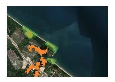 Satellite image with mangrove flood-protection zones highlighted along the coast